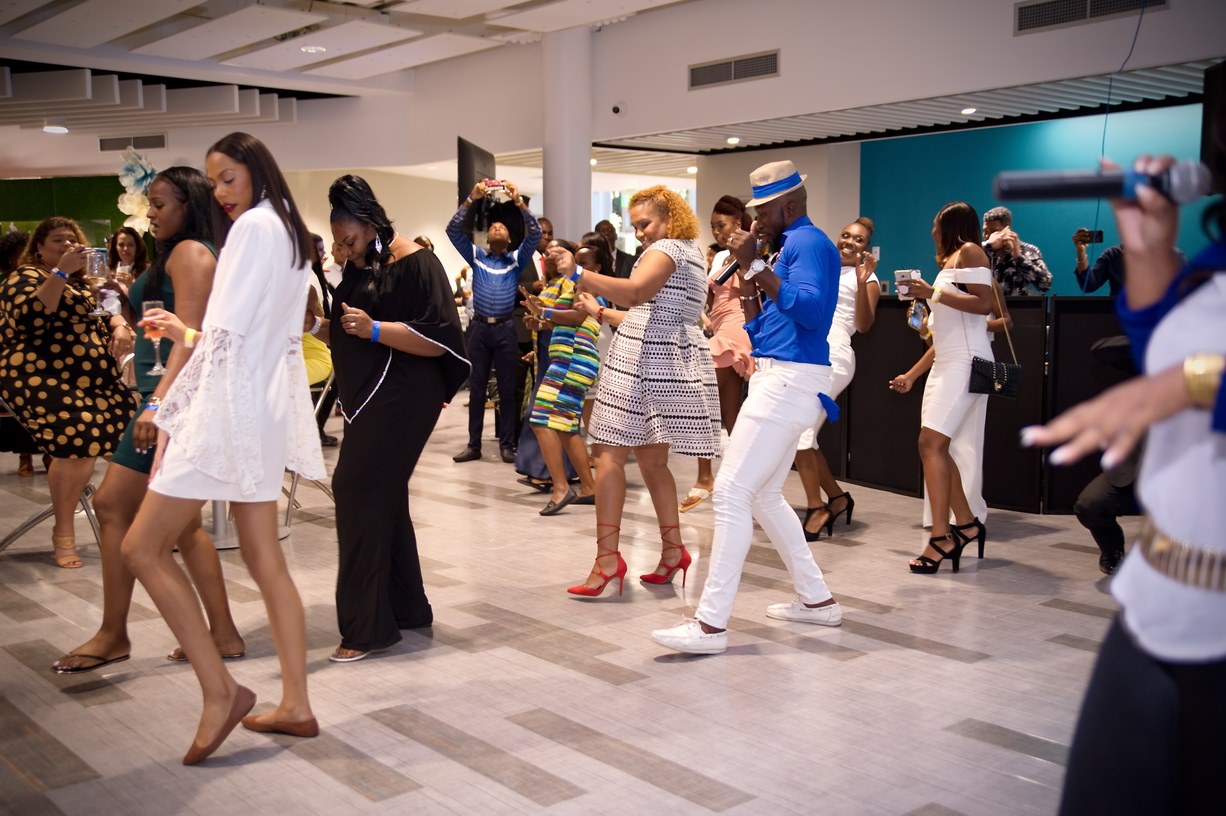 Graduates dancing at the celebration reception