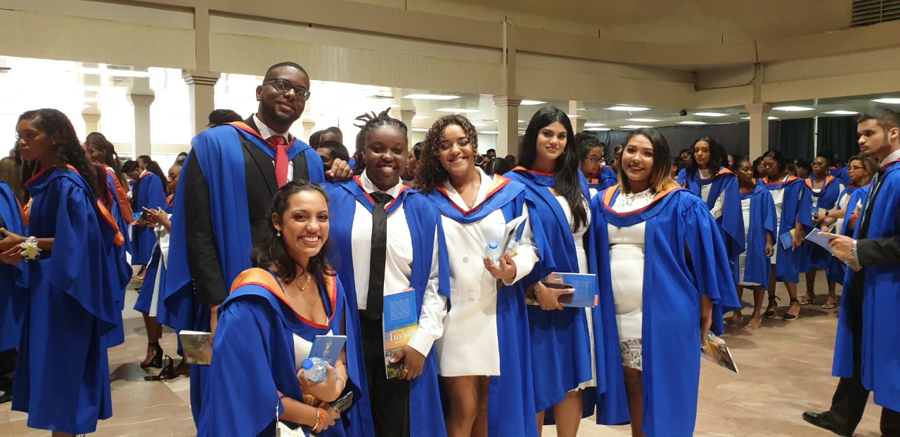Graduates in academic gowns at the ceremony