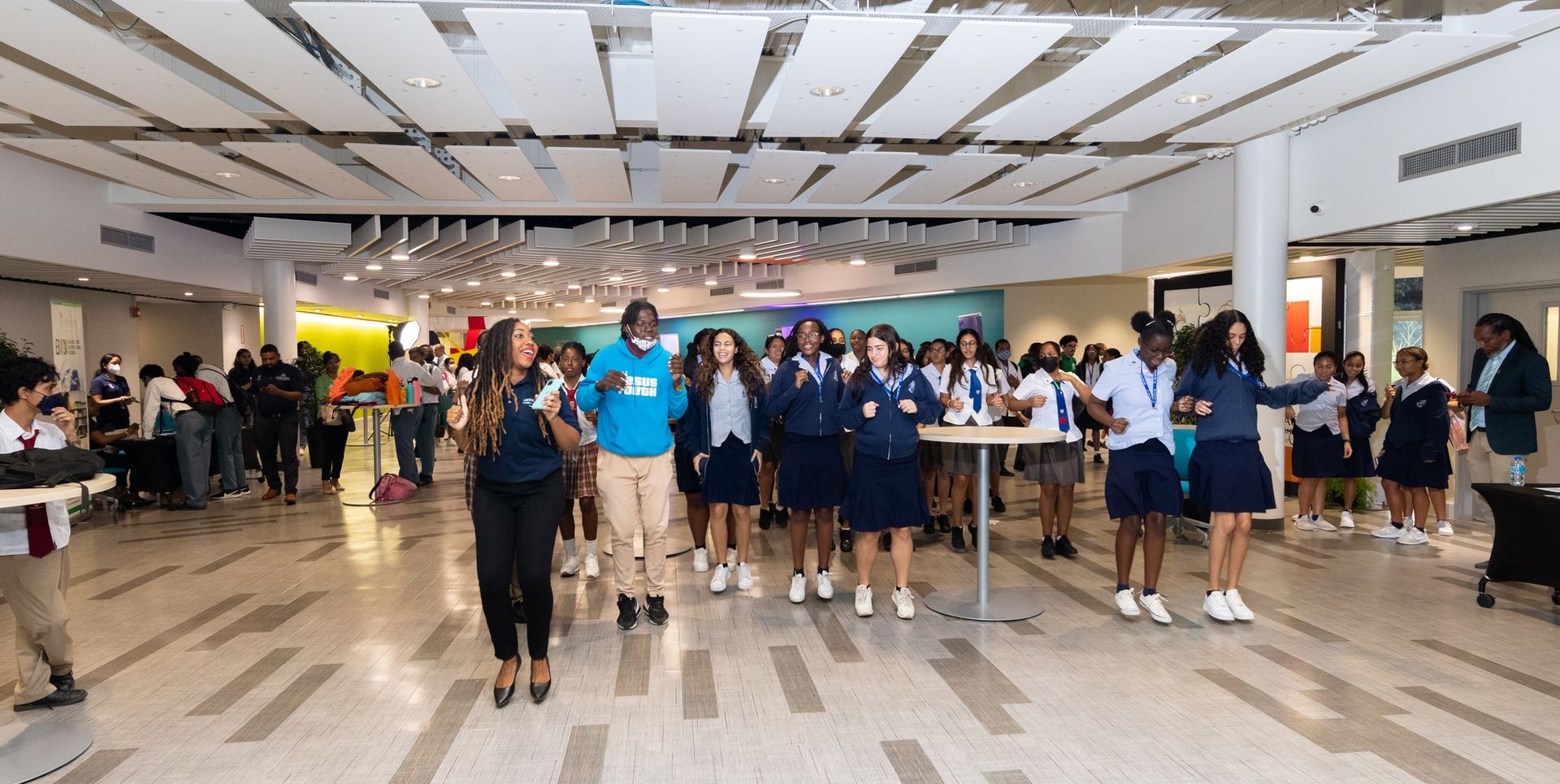 Visitors and students in the campus concourse