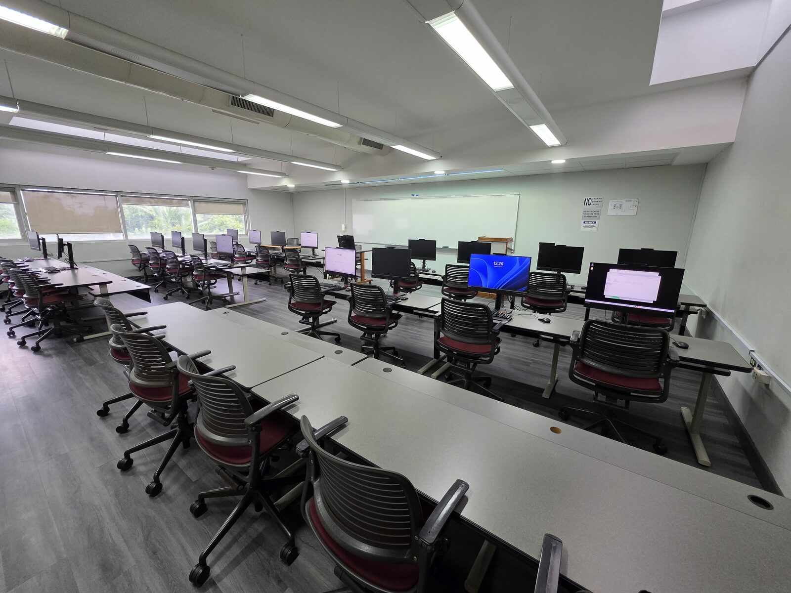 Learning Centre 1 - rows of desktop workstations facing the front of the room