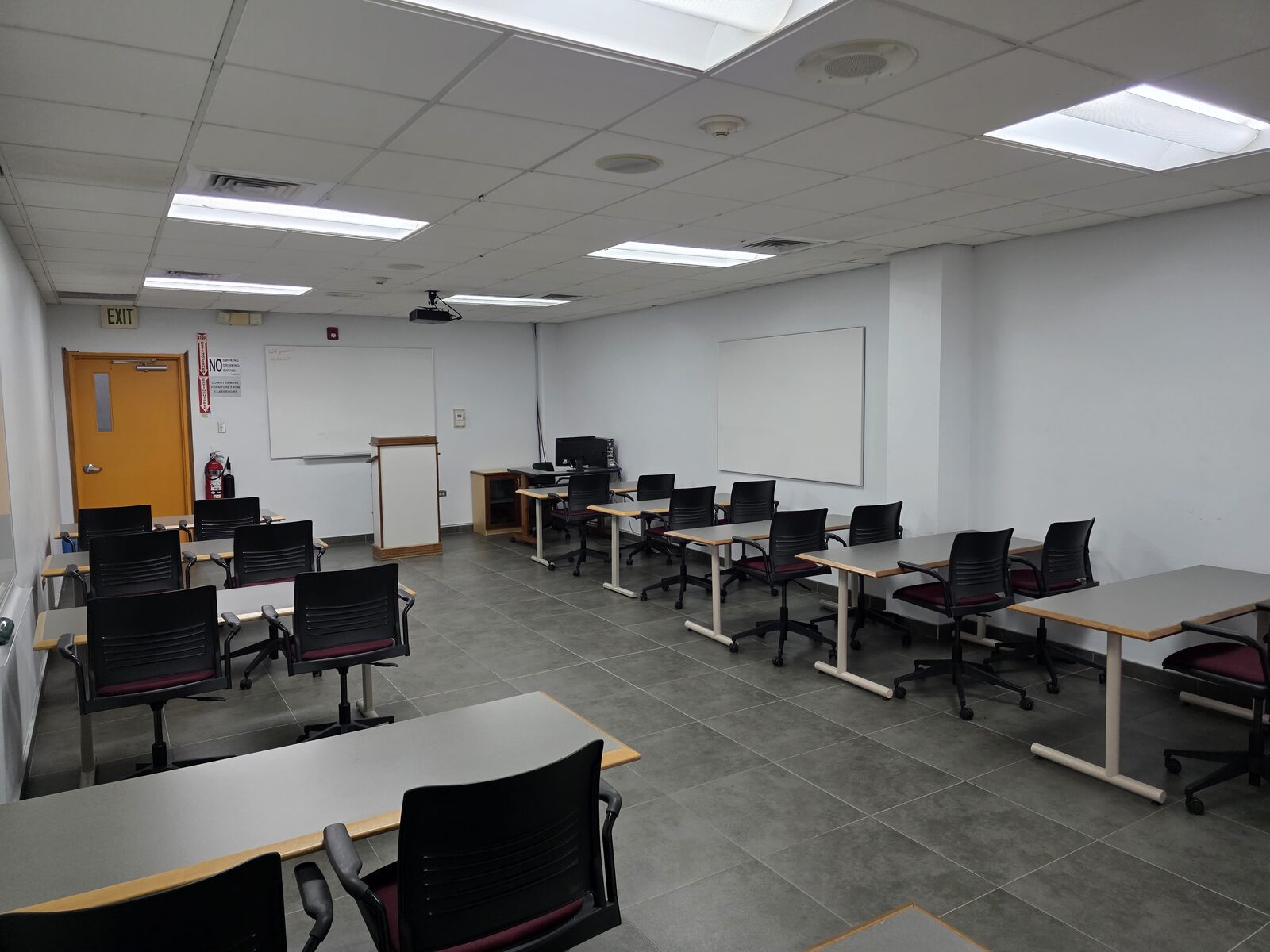 Room 105 and Room 106 - the room looking toward the entrance and whiteboard