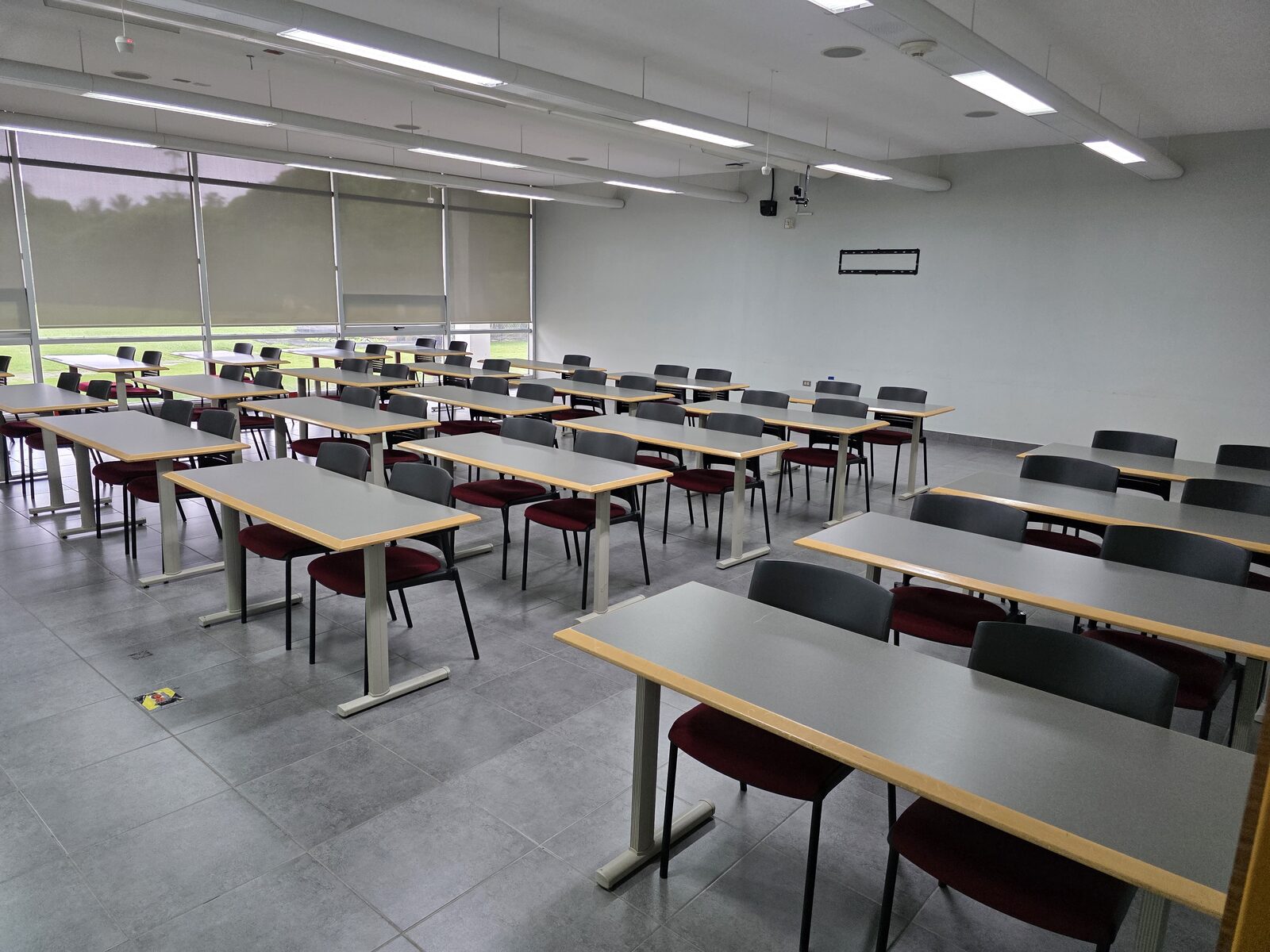 TSTT Room - the room laid out in classroom style beside the window wall