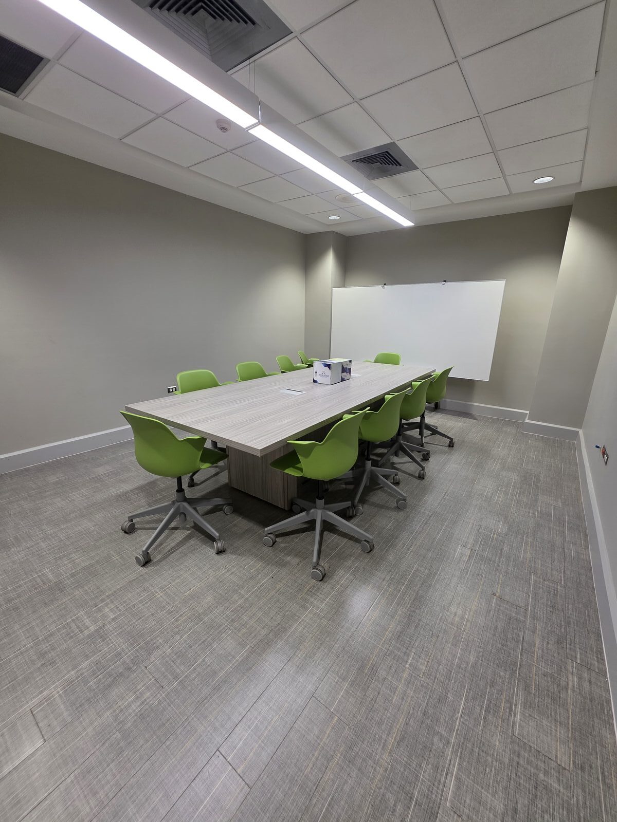 New Wing Small Meeting Room - the meeting table seen from the corner of the room